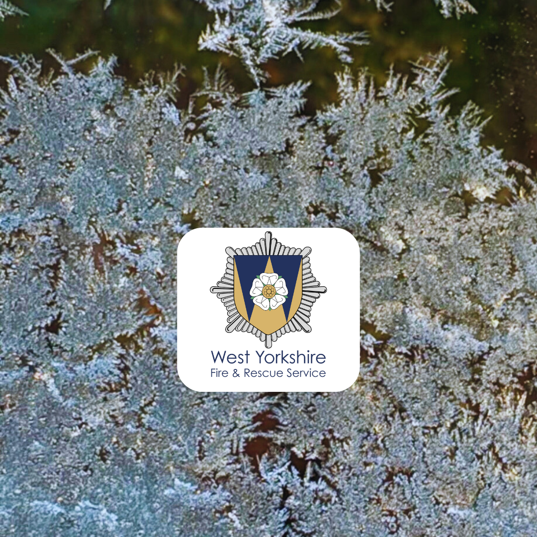 Ice on a window with WYFRS logo